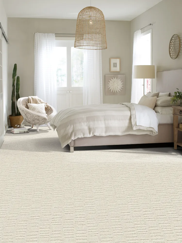 beige carpet in bedroom with beige walls